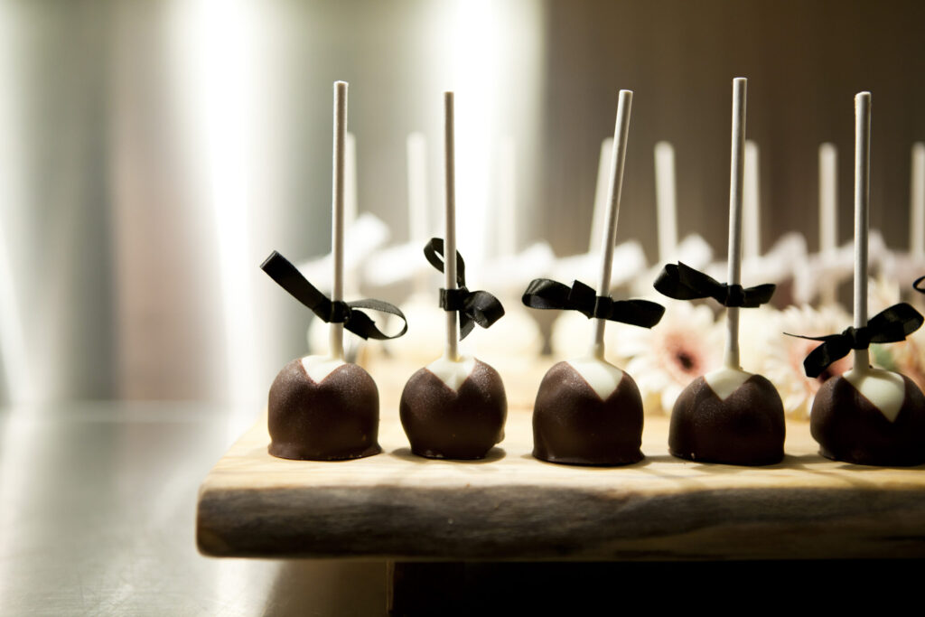 Chocolate-dipped dessert bites at a catered event
