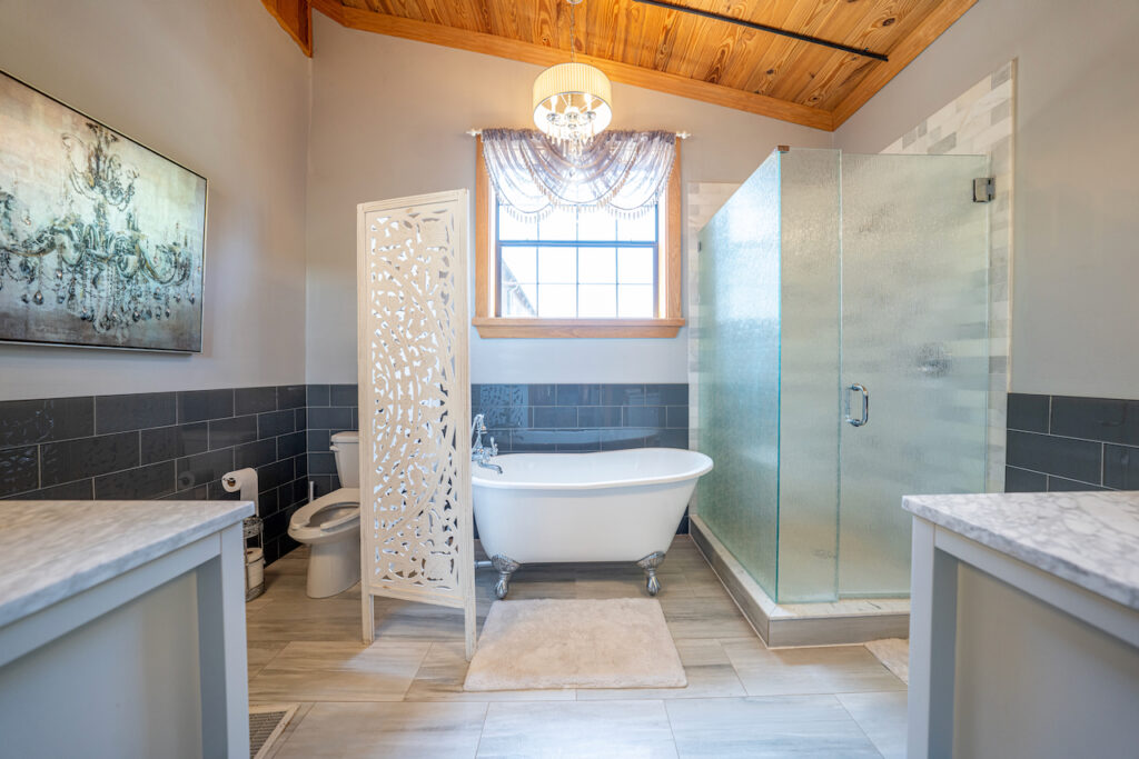 Bridal suite bathroom with soaking tub and glass shower