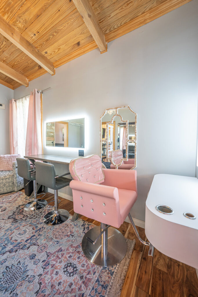 Bridal suite hair and makeup stations with lighted mirrors